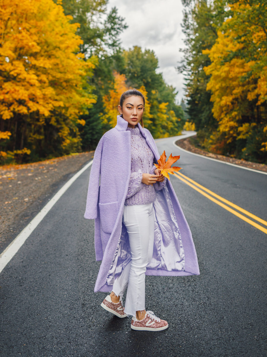 How to Wear 2018's It Color Lavender // Notjessfashion.com // Lavender coat, white cropped flare jeans, cropped flare jeans, glittery sneakers, fall fashion, winter fashion, white and lavender outfit, asian blogger, fashion blogger, new york fashion blogger, how to wear lavender, lavender outfits, fashion blogger street style, jessica wang, cozy outfit, casual fall outfit