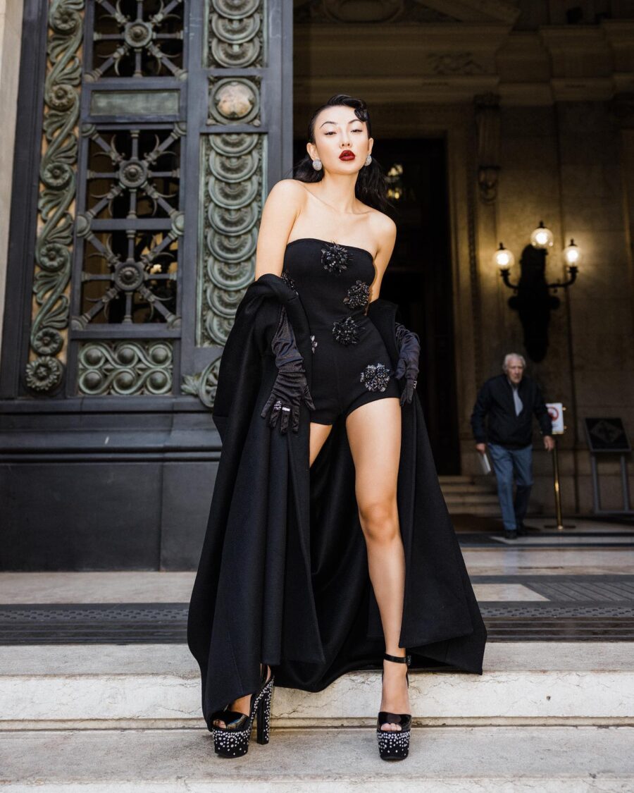 Jessica Wang wearing a black romper with giuseppe zanotti sandals while sharing anti aging body skincare routine // Jessica Wang - JessicaWang.com