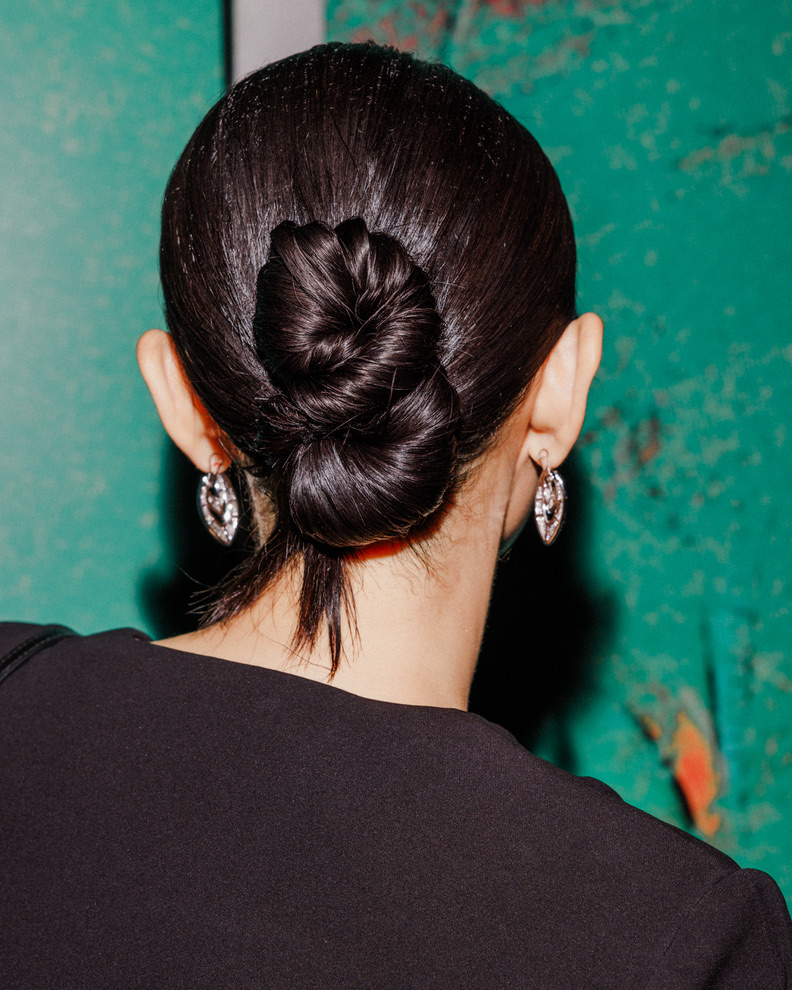 Back view of Jessica Wang wearing a polished low bun
