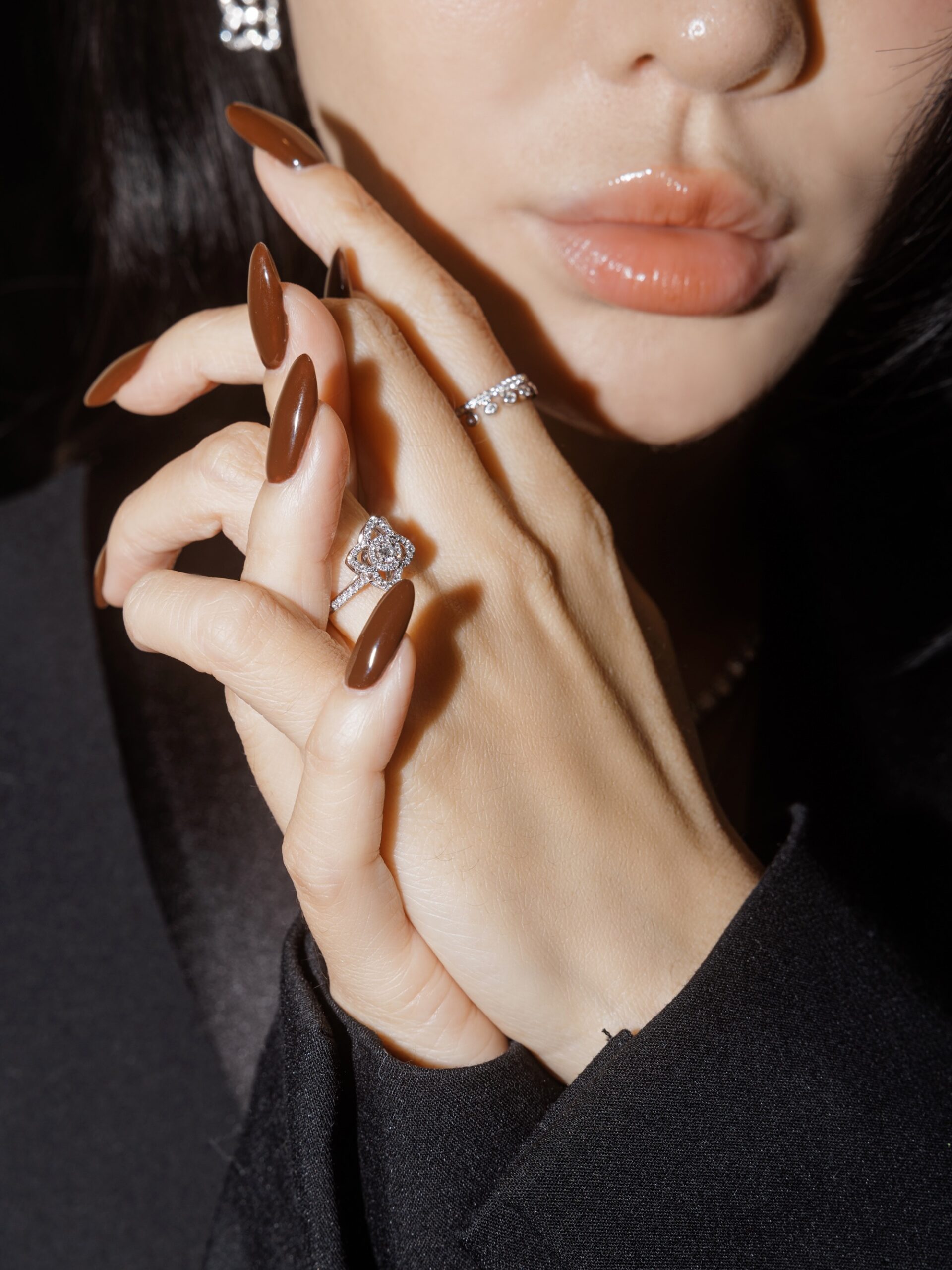 Close portrait of Jessica Wang wearing softly blended neutral lip color
